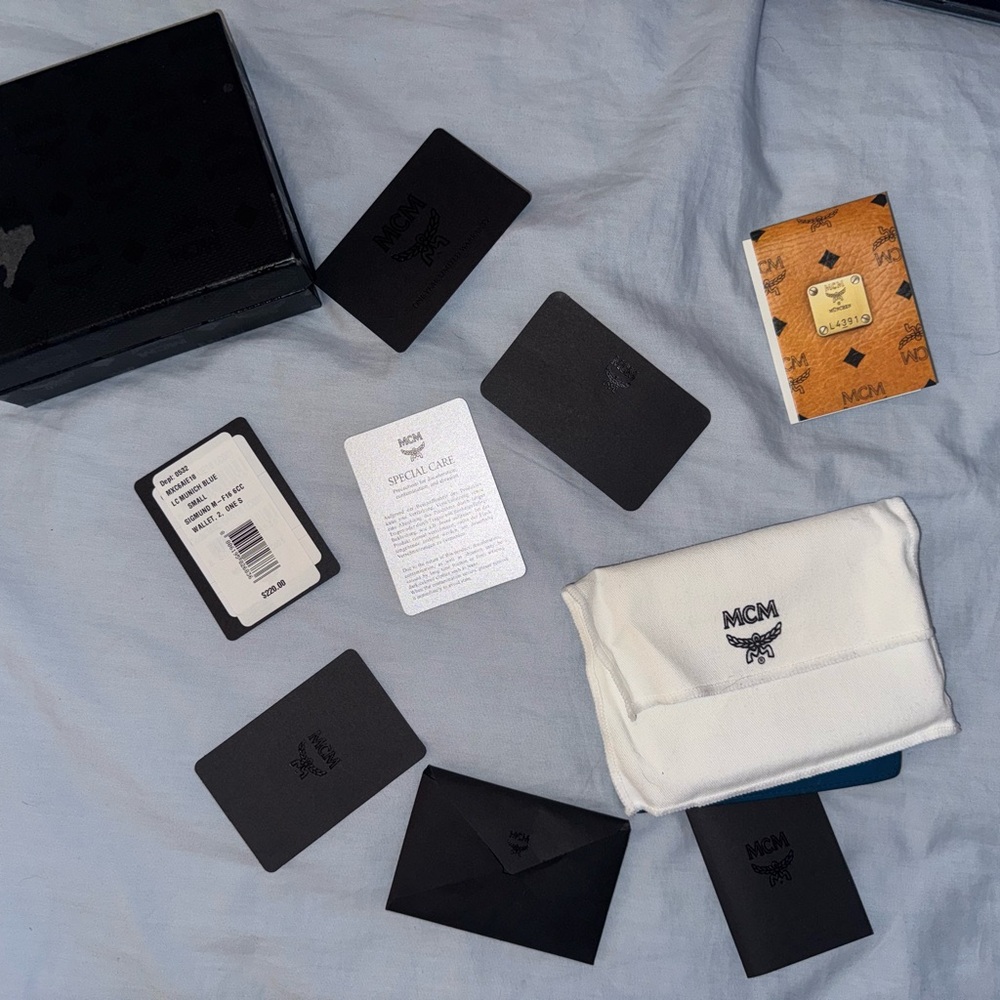 MCM Navy Embossed Leather Wallet - Picture 8 of 8